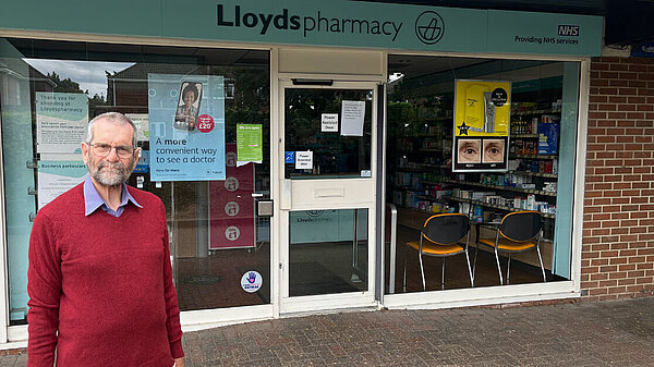 Owen Jeffery stood in front of a pharmacy