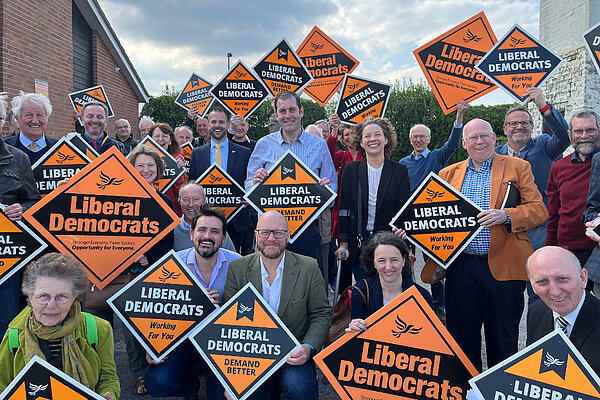 A large group of Liberal Democrats with orange correx diamonds